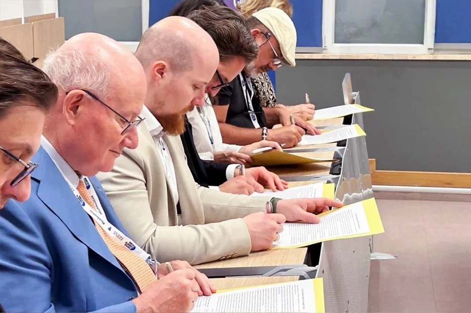 Religious-scholars-signing-an-appeal-requesting-an-end-to-Chairman-Lees-detention.webp